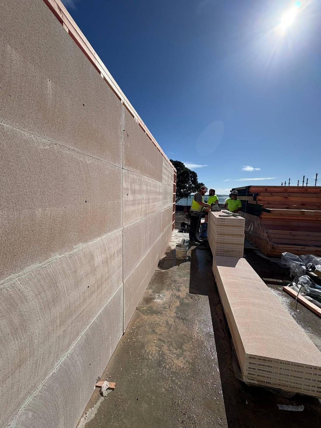 Interior wall in burnished lime plaster, showing the soft tonal variation of a hand-polished finish