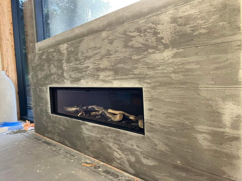 Traditional solid plaster applied by hand over a block substrate